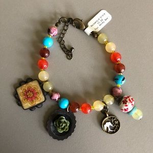 Bead bracelet with charms